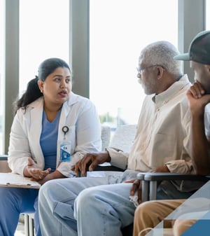 Woman doctor speaking with mature client and his adult son
